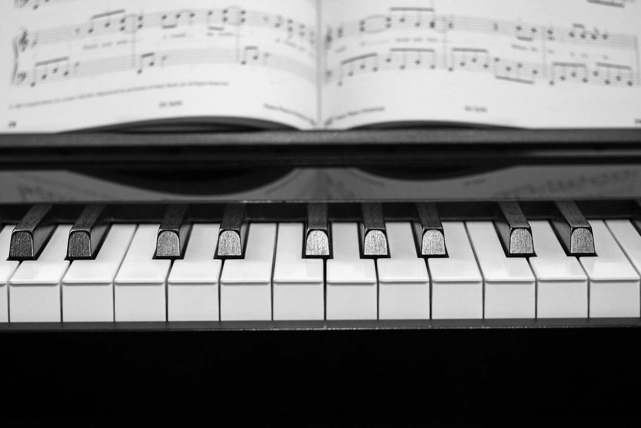 Piano keys with sheet music